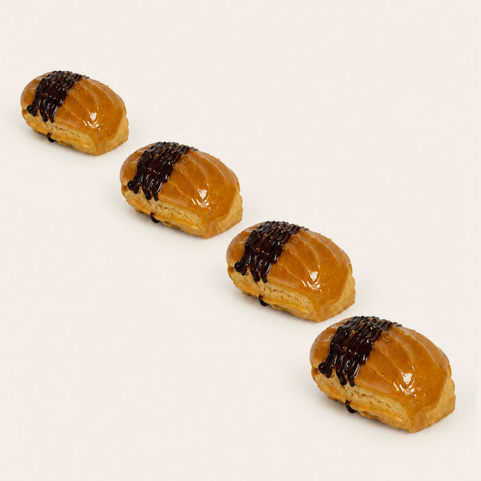 Coco 9 Caramel Éclair, part of a box of twelve