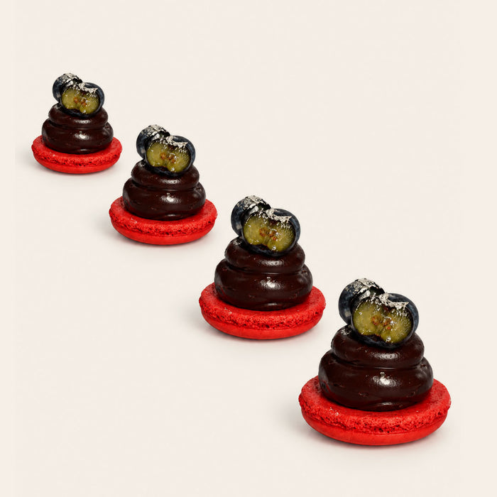 Coco 9 Macaron Queen petit four, part of a box of twelve