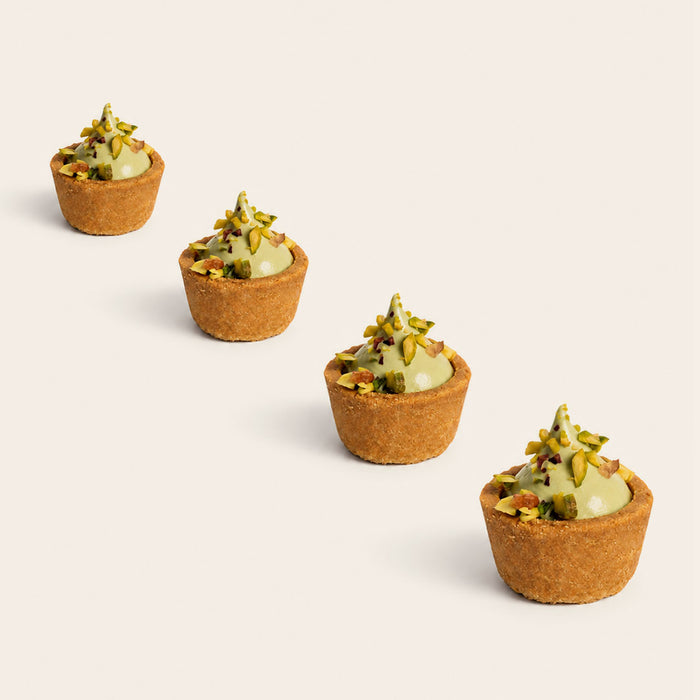 Coco 9 Pistachio Cheesecake Tart, part of a box of twelve