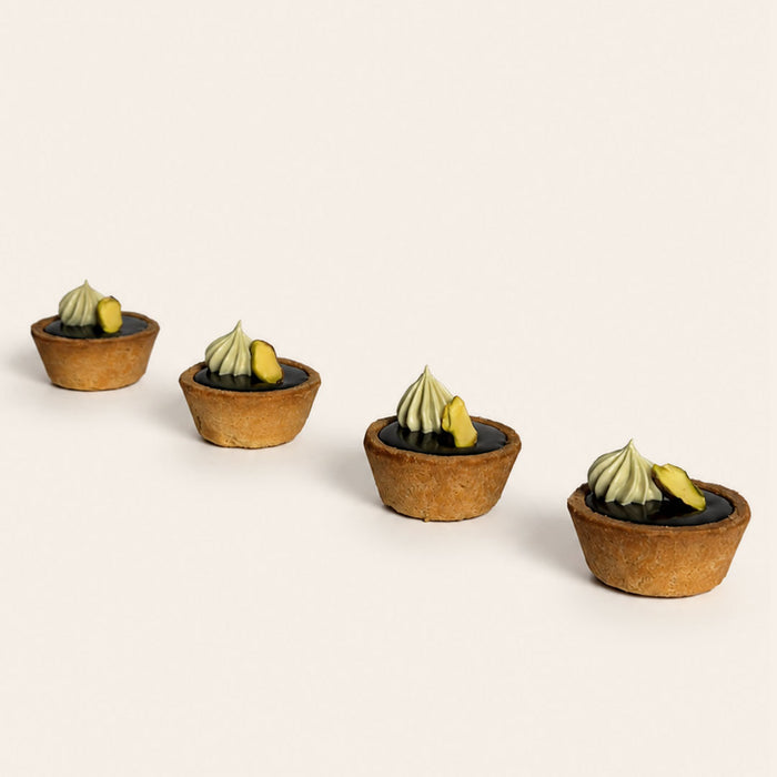 Coco 9 Pistachio Kunafa Tart, part of a box of twelve