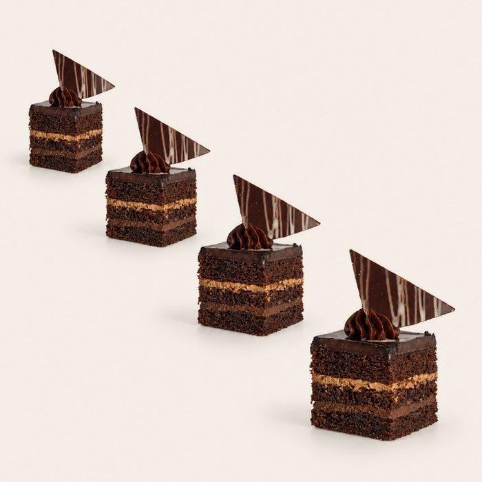 Coco 9 Triple Chocolate petit four, part of a box of twelve